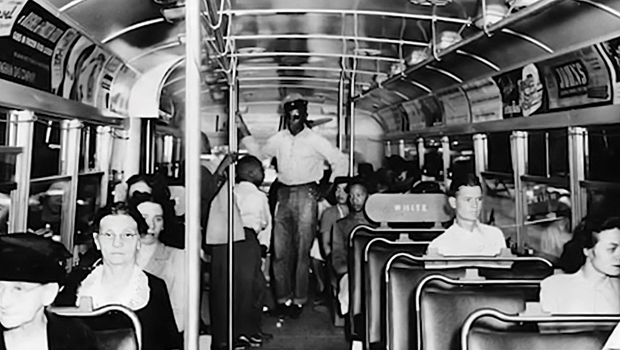 Blacks crowded in the rear; extra seats in the Whites-only section in the front.